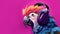 A bright parrot in headphones listens to music on a pink background. Place for text, copyspace