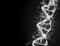 A bright particulate 3D rendered DNA on a dark bokeh background