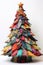 bright patchwork Christmas tree on grey background