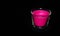 Bright pink candle in a glass jar on a black background. The candle is burning. Extinguished candle. Smoke from the candle. Hearth