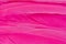 Bright pink coloured feathers background.