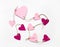 Bright pink paper hearts connected with a rope for Valentine`s day. Flat lay on white background
