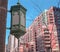 Bright pink residential building with street light in foreground