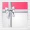 Bright pink square card with silver ribbon