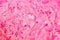 Bright pink uneven yoghurt for texture background