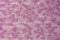 Bright pink white melange knitwear wool fabric texture background. Abstract textile backdrop