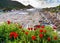 Bright poppies with ruins of Knidos city in Turkey on background