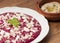 Bright purple beetroot puree with goat\'s cheese