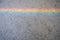 Bright rainbow on a gray concrete background