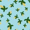 Bright random seamless pattern with yellow and green colored palm tree ornament. Blue background