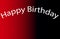 Bright red and black blurred colourful background computer generated picture with happy birthday note.