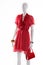 Bright red dress on mannequin.