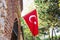 Bright red flag of Turkey. State symbols of Turkiye.