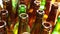 Bright red and green necks of bottles, the top view