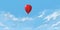 Bright red heart shaped balloon rises into the blue sky with white clouds