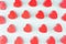 Bright red hearts on mint pastel paper background. Valentine`s day youth design concept art.