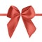Bright red silk ribbon or tape decorated with bow. Fancy decorative design element. Beautiful festive glossy satin