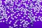 Bright and Shiny Precious Rhinestone Swarovski crystal color on a purple background.