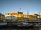 Bright small houses and ships along the Nyhavn Canal. Denmark, Copenhagen.