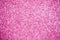 Bright sparkle pink background. Holiday and festive concept.