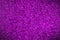 Bright sparkle violet background. Holiday and festive concept.