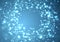 Bright sparkling shimmering abstract empty circle over blue grad