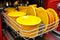 Bright, Sparkling Yellow Dishes Glistening Clean in the Dishwasher - Pristine Kitchenware