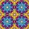 Bright stained glass background. Colorful kaleidoscope seamless pattern with decorative round ornaments. Floral motif.