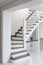 bright staircase in a white room