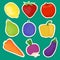 Bright stickers of fruits and vegetables isolated on a green background with white rims