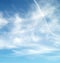 Bright Summer Sky, Wispy Cirrus Clouds and Plane Trails