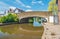 A bright summer sunny morning on the Leeds-Liverpool canal near Burscough with wonderful reflections