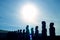 Bright Sun Raising over the Silhouette Gigantic Moai Statues of Ahu Tongariki Celemonial Platform, Easter Island, Chile