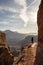 Bright Sun Shines Over Hiker along the South Kaibab Trail