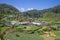 Bright sunny rural landscape of the outskirts of the town of Nuwara Elia
