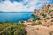 Bright sunny view of Melagavi lighthouse in the Corinth Gulf. Splendid spring seascape in the Greece, Europe. Beauty of nature con