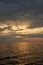 Bright sunset on the Baltic Sea coast upright photo