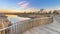 Bright sunset over Wooden planked balcony