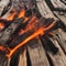 Bright tongues of fire licking at the edges of dry wood