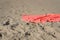 Bright towel on the sand on the beach, steps on the sand