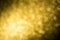 Bright unfocused gold abstract bokeh background