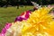 Bright and vibrant flower bouquet at cemetery