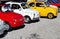 Bright vintage  colorful Fiat 500s   waiting to participate in an auto gathering later