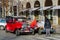 Bright vintage excursion cars on Parizska street near Old Town Square in Prague, Czech Republic