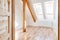 Bright white empty attic room in the loft apartment