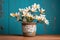 bright white magnolia blooms in a rustic pot