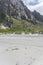 Bright white sand beach and steep rock crags, Bleik , Norway