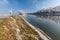 Bright winter scenery, with frozen river and trees