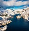 Bright winter view from flying drone of Nusfjord town, Norway, Europe.