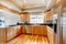 Bright wood kitchen with coffered ceiling